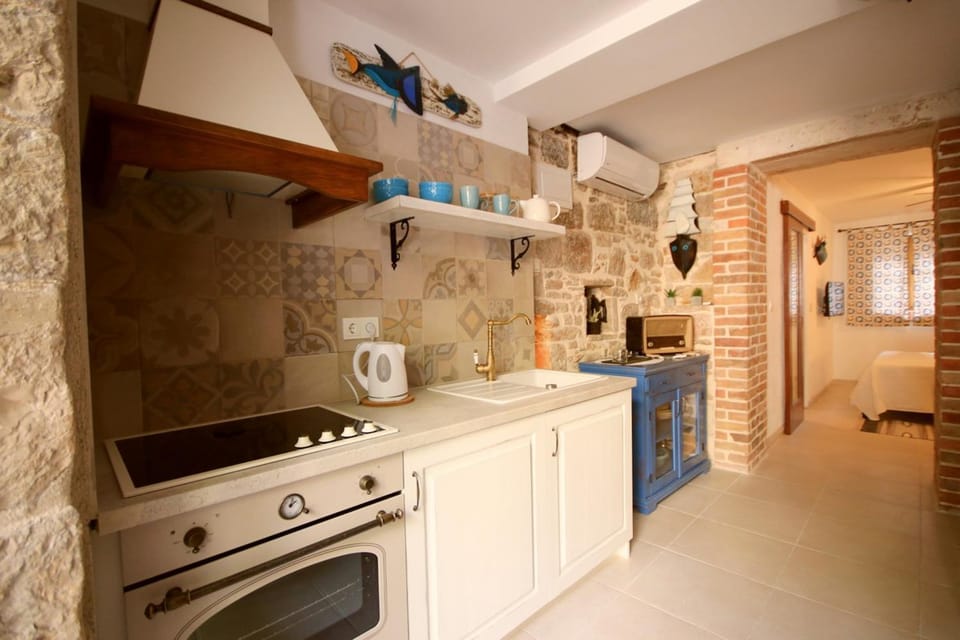 Kitchen or kitchenette, stove