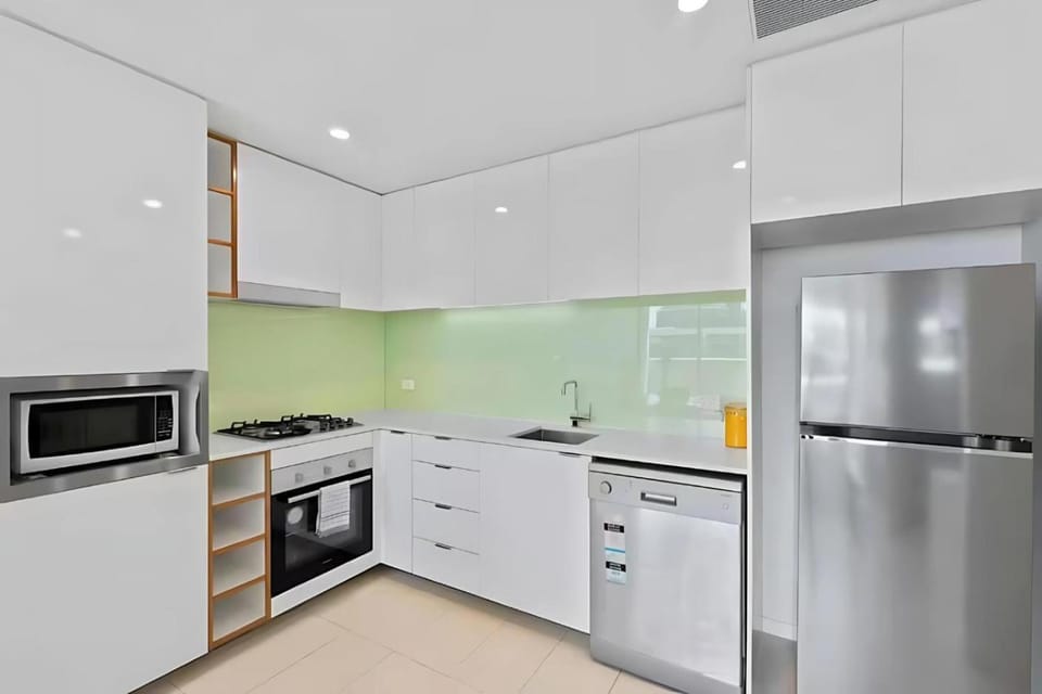Kitchen or kitchenette, dishwasher, oven, stove, toaster