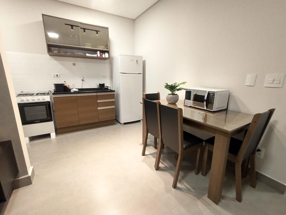 Kitchen or kitchenette, microwave, oven, stove