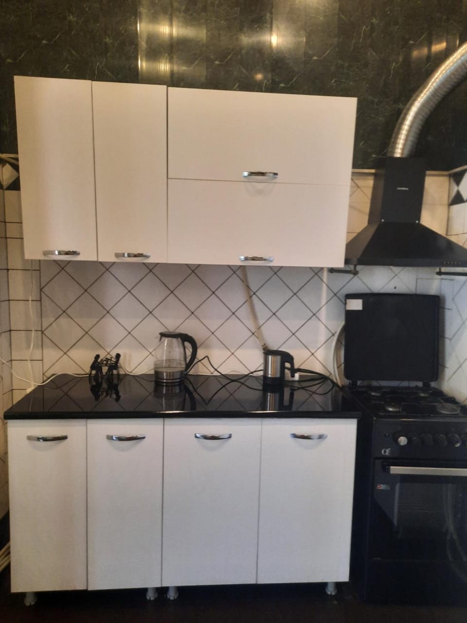 Kitchen or kitchenette, stove