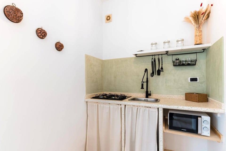 Kitchen or kitchenette, oven, stove
