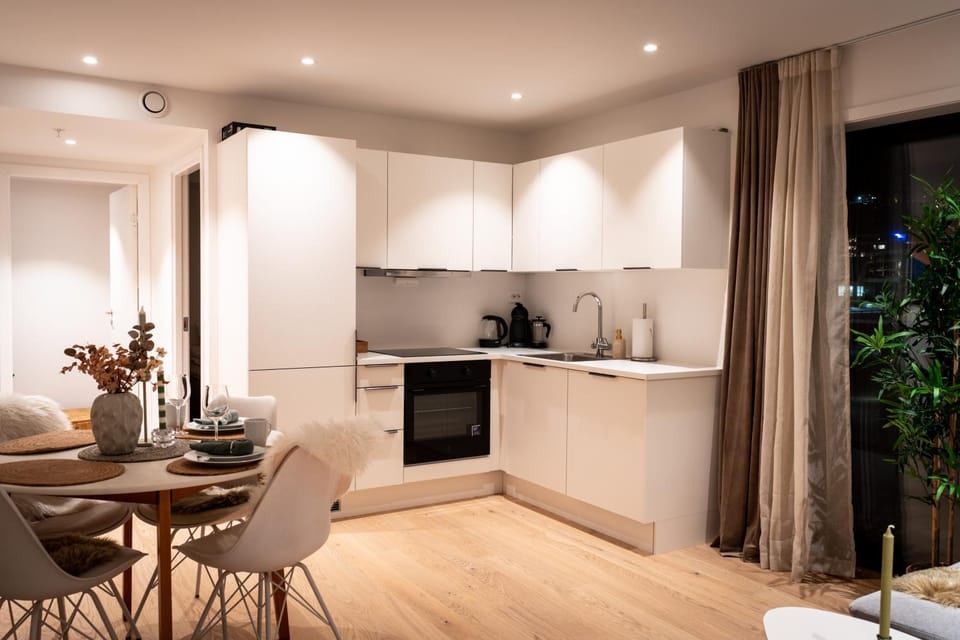 Coffee/tea facilities, Kitchen or kitchenette, Living room, Seating area, Dining area, oven, stove