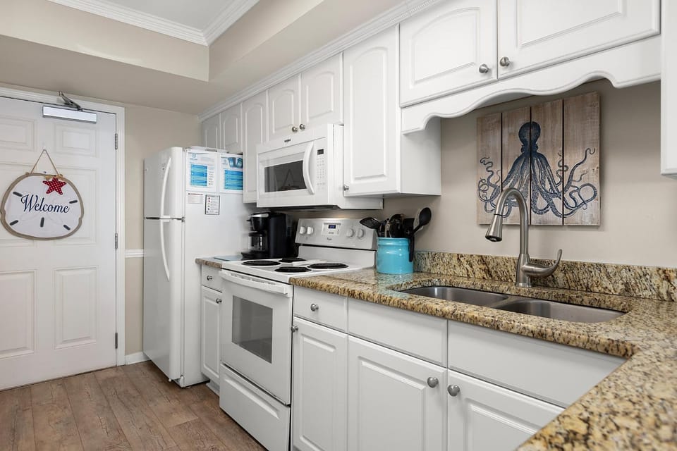 Kitchen or kitchenette, microwave, oven, stove, kitchen