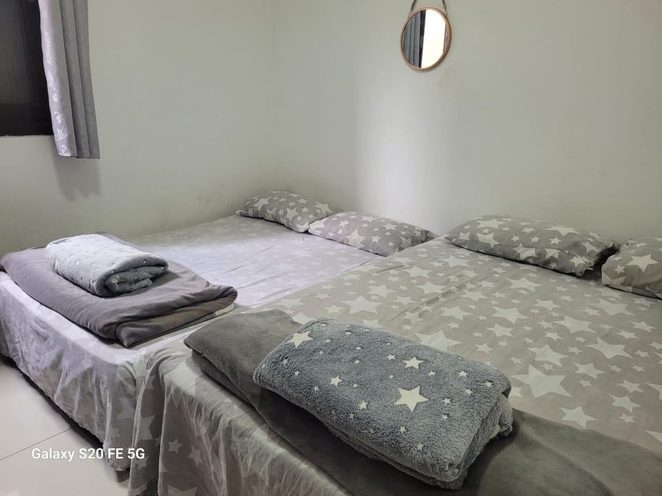 Casa Terrea com piscina e churrasqueira pertinho da praia para ate 34 hospedes House in Itanhaém