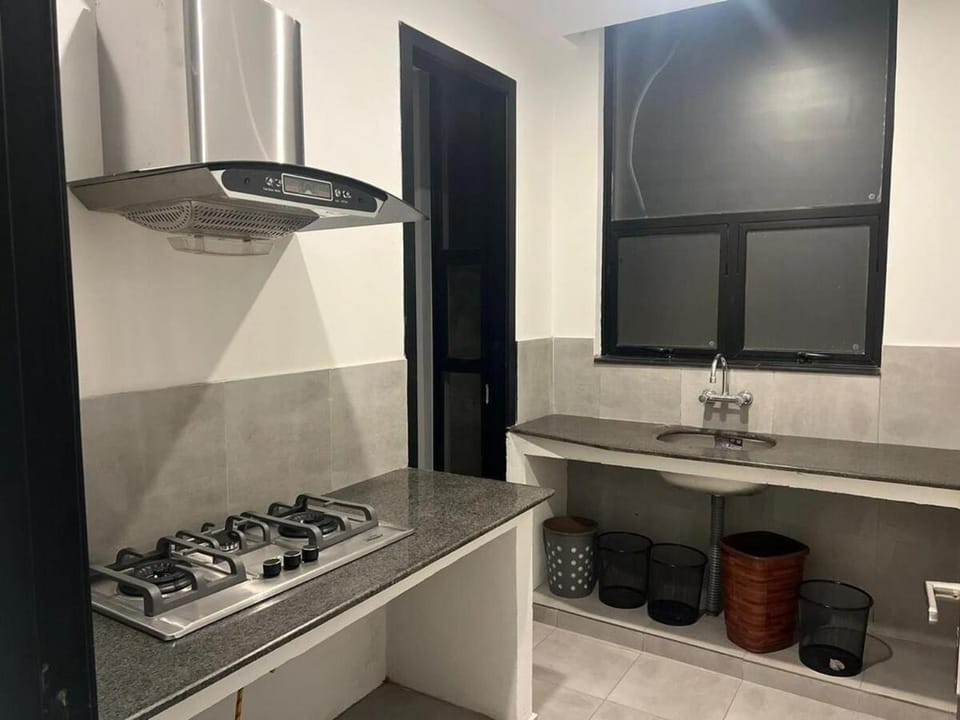 Kitchen or kitchenette, stove