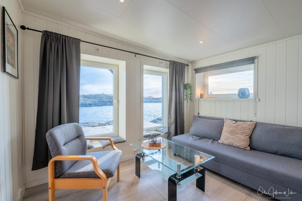 View (from property/room), Living room, Seating area, Sea view