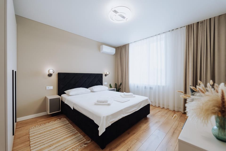 Bed, Photo of the whole room, Bedroom, towels, air conditioner