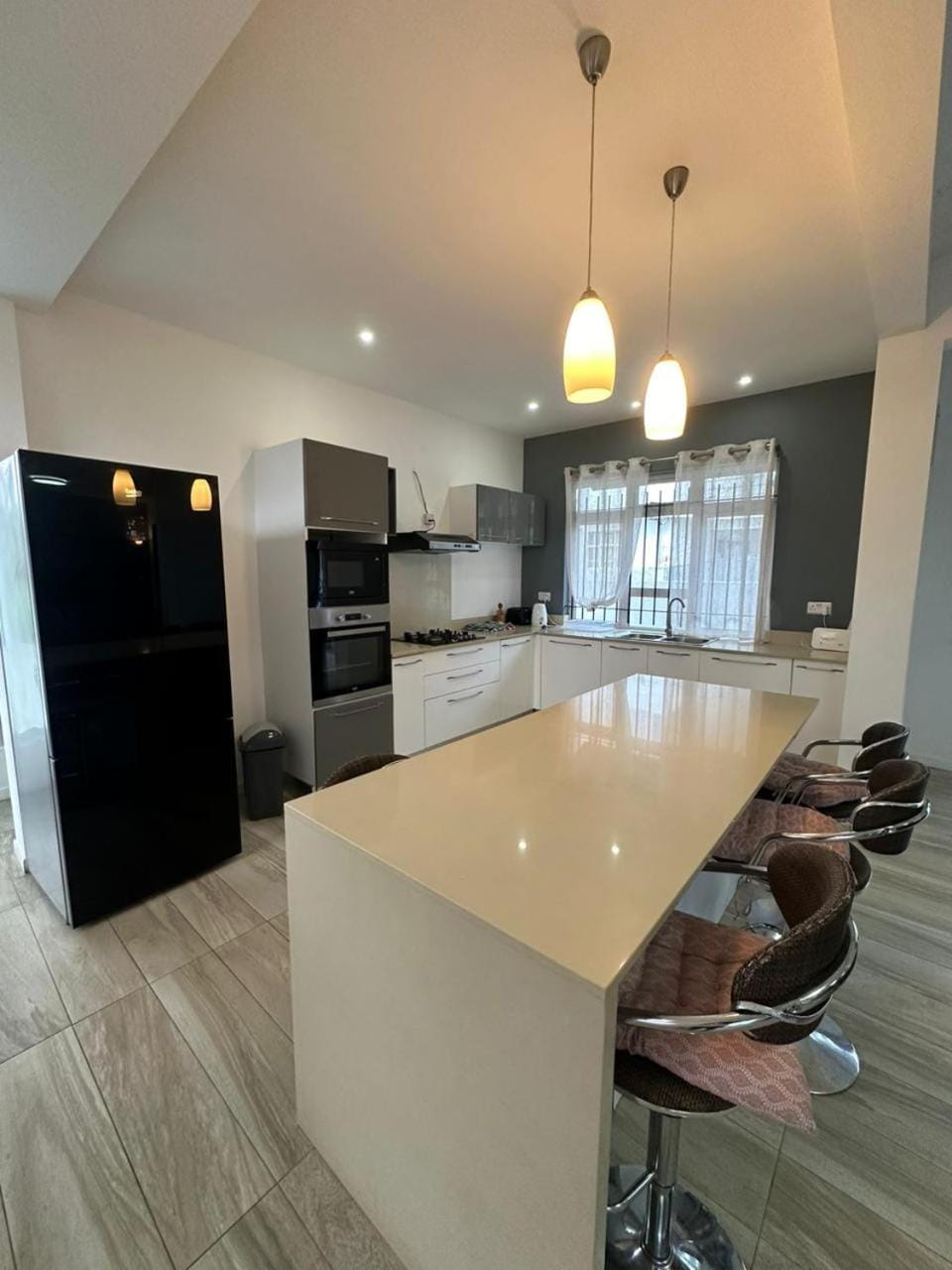 Kitchen or kitchenette, stove
