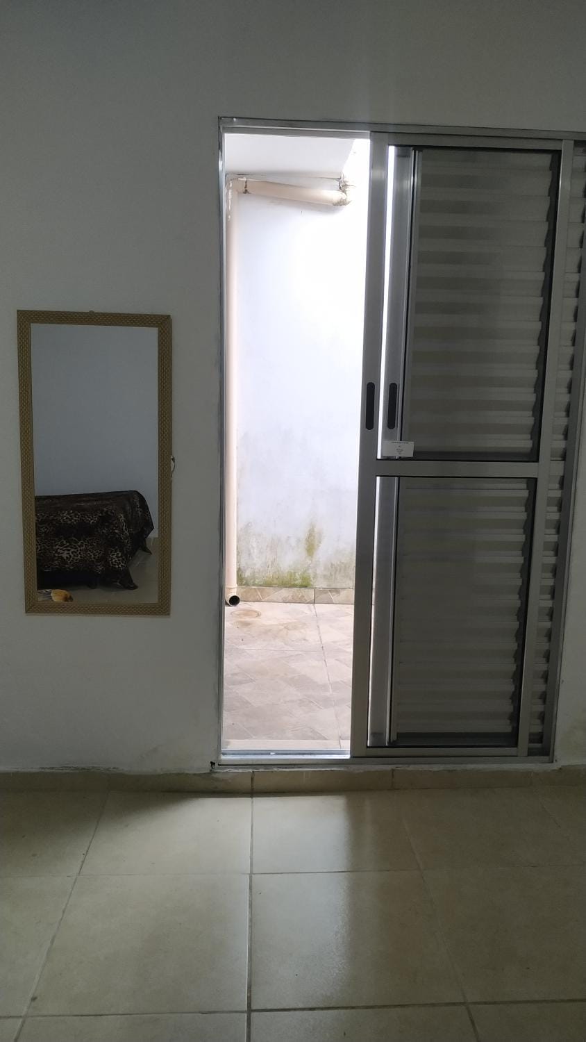 Quarto em Casa de Família Vacation rental in Itanhaém