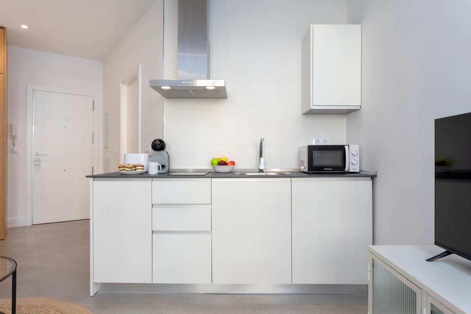 Kitchen or kitchenette, stove, toaster