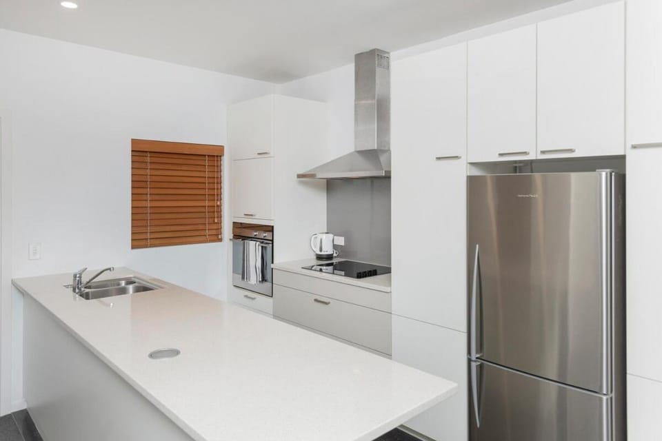 Kitchen or kitchenette, dishwasher, oven, stove