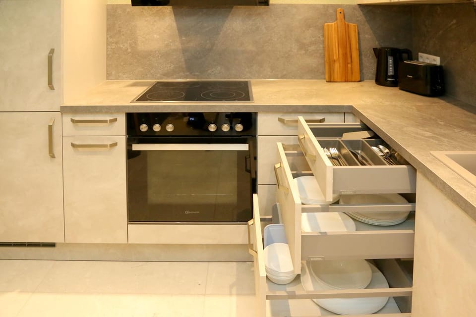 Kitchen or kitchenette, dishwasher, oven, stove, kitchen