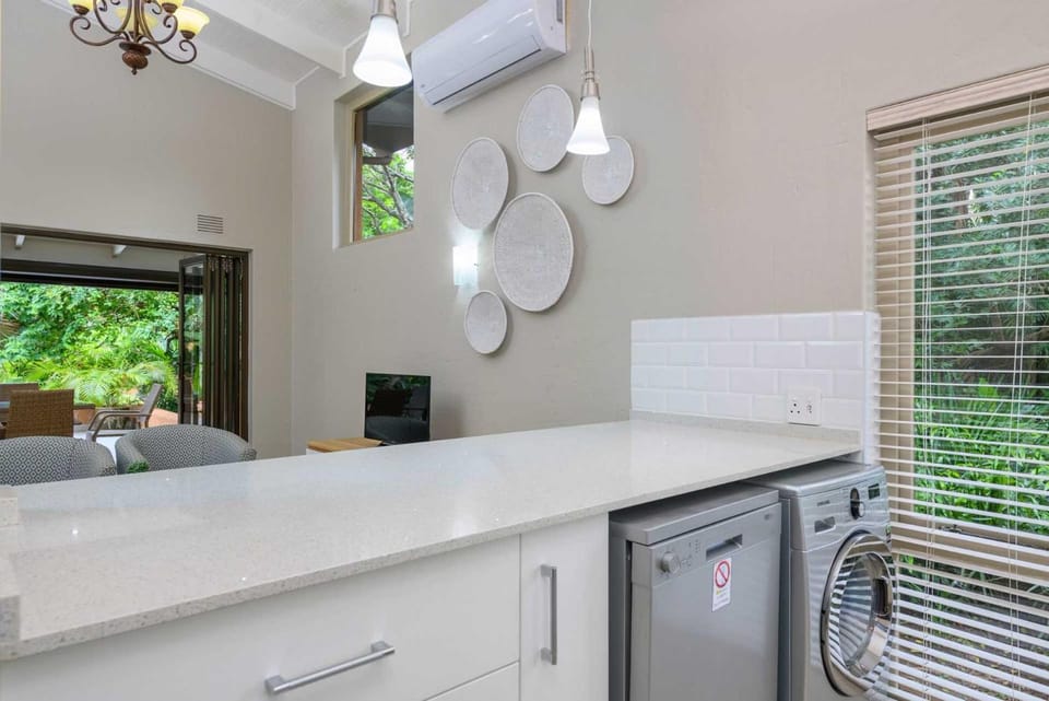 Kitchen or kitchenette, dishwasher, washing machine, dryer