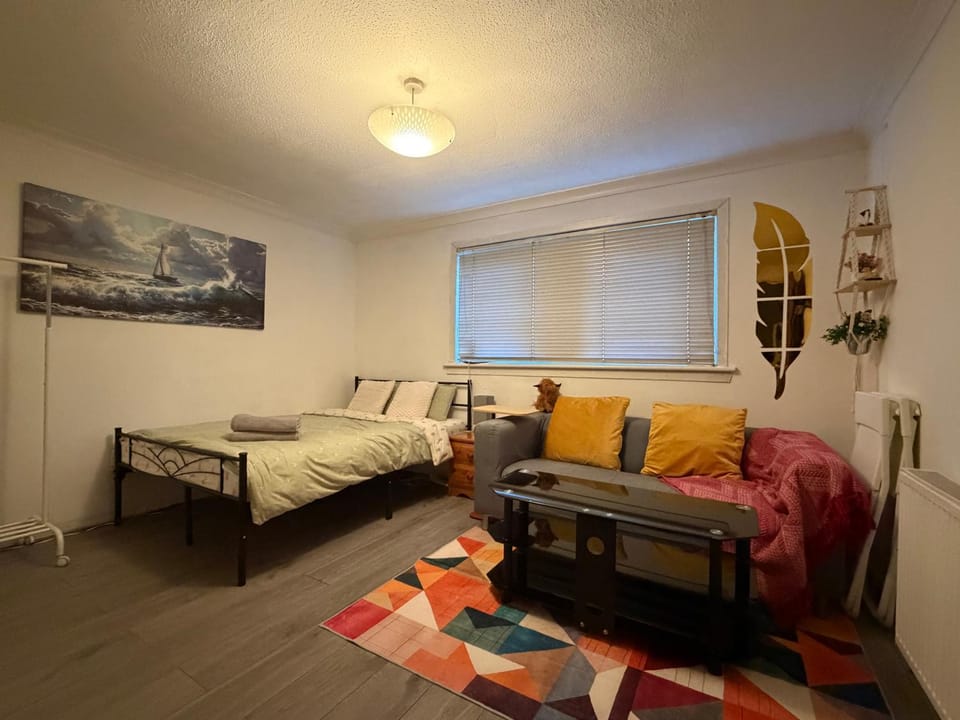 Bed, Seating area, Bedroom