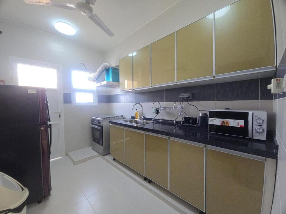 Kitchen or kitchenette, oven, stove