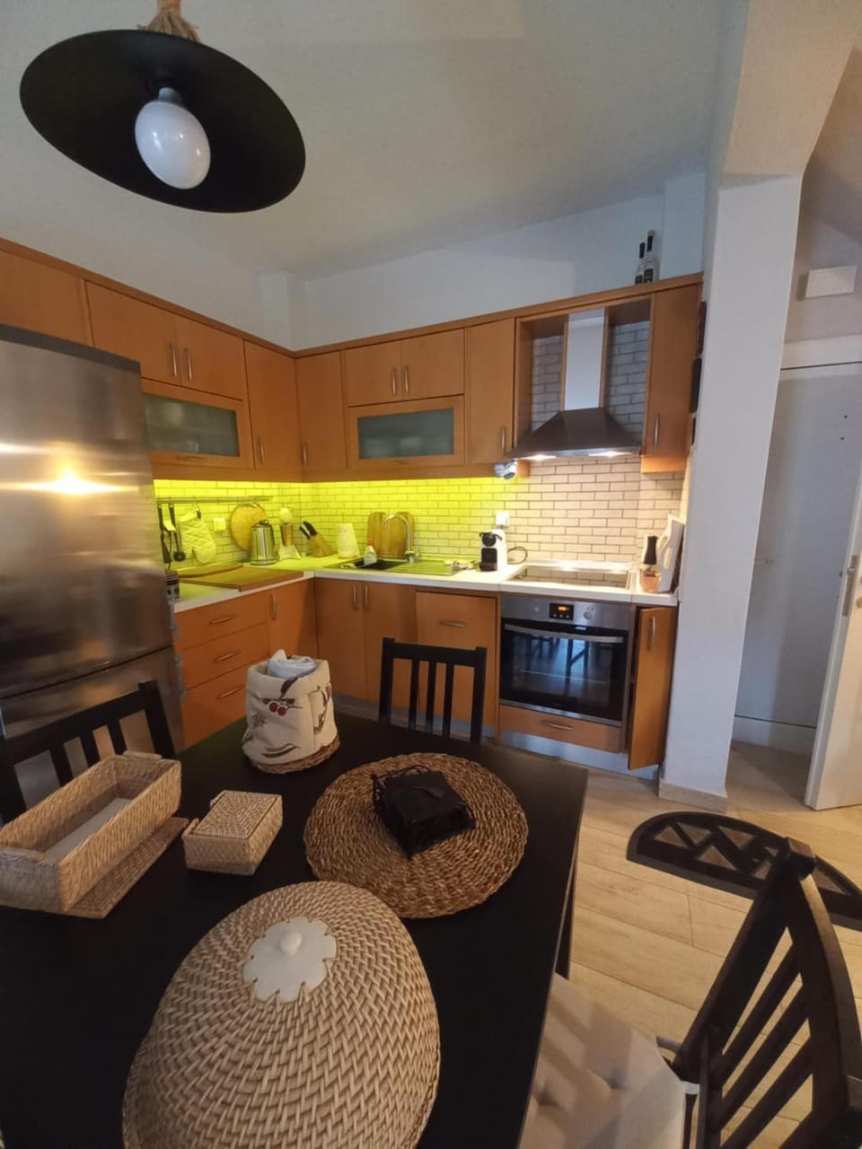 Kitchen or kitchenette, dishwasher, oven, stove