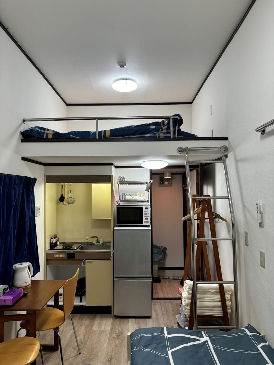 Photo of the whole room, Dining area, bunk bed, stove