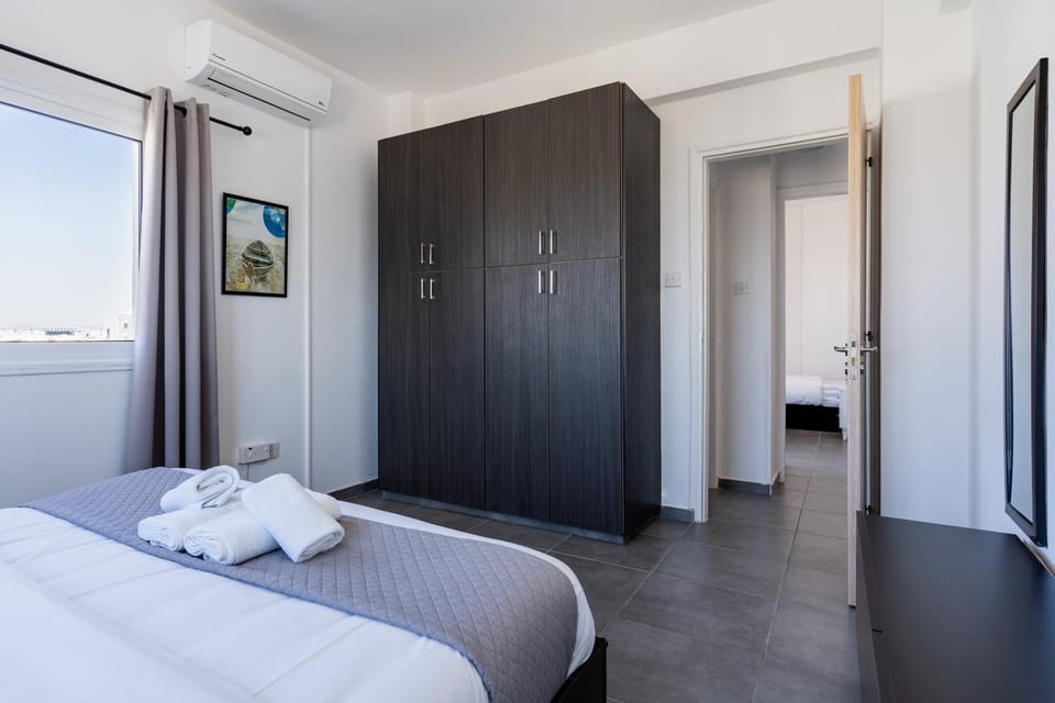 Bed, Bedroom, towels, wardrobe, air conditioner