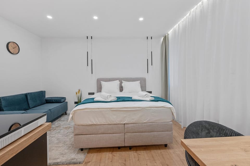 Bed, Living room, Seating area, Bedroom