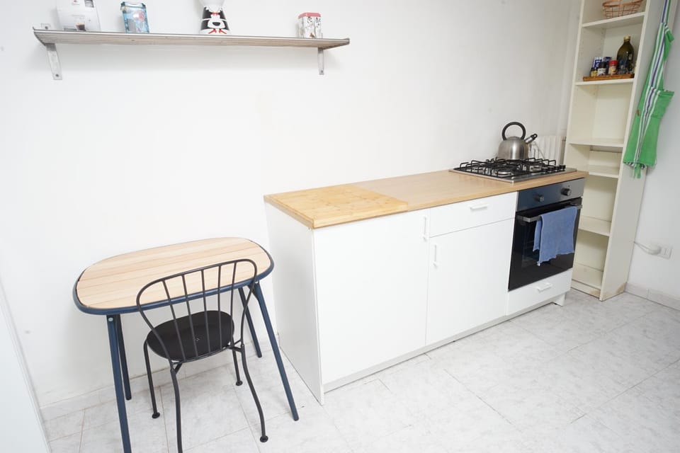 Kitchen or kitchenette, oven, stove