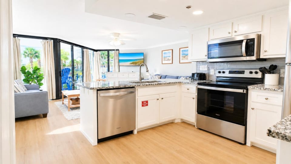 TV and multimedia, Kitchen or kitchenette, Seating area, dishwasher, oven, stove, kitchen