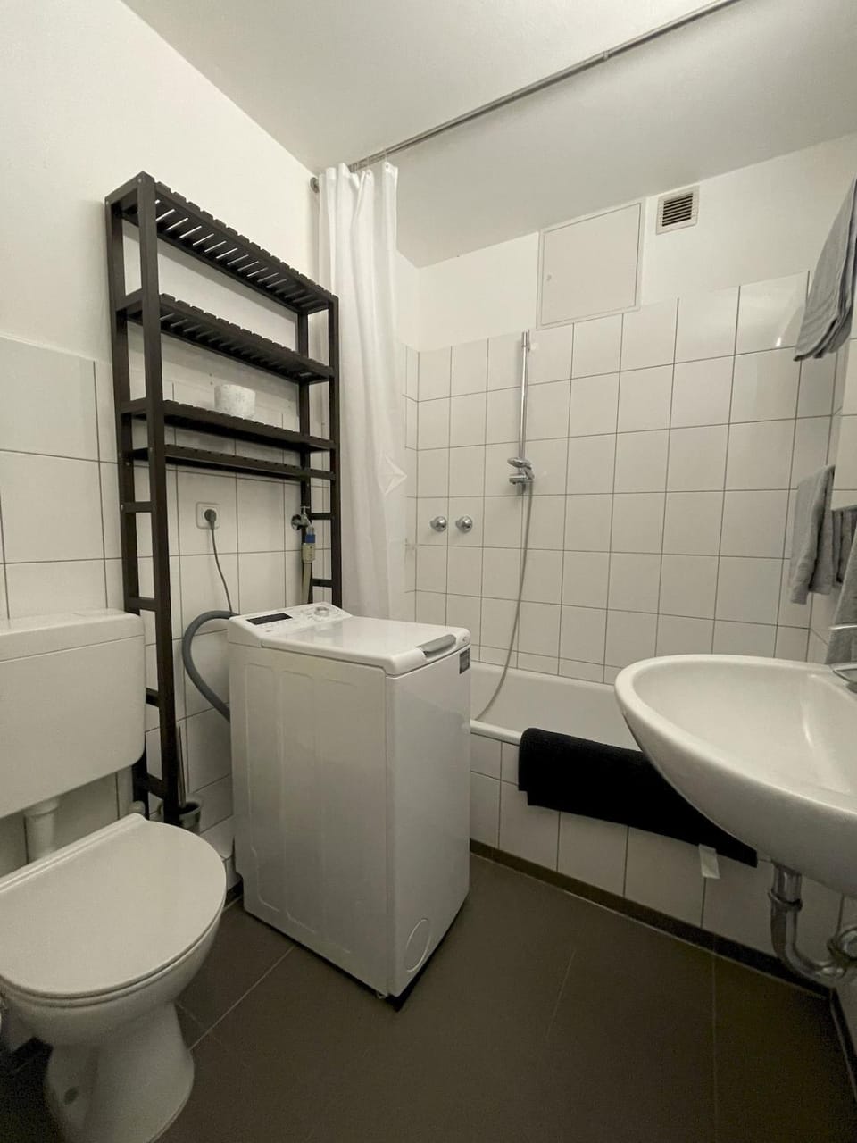 Shower, Toilet, Bath, towels, washing machine