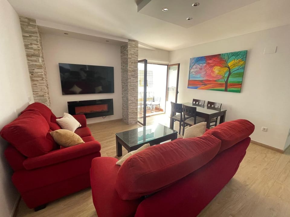 TV and multimedia, Balcony/Terrace, Living room, Seating area, Dining area, fireplace, air conditioner