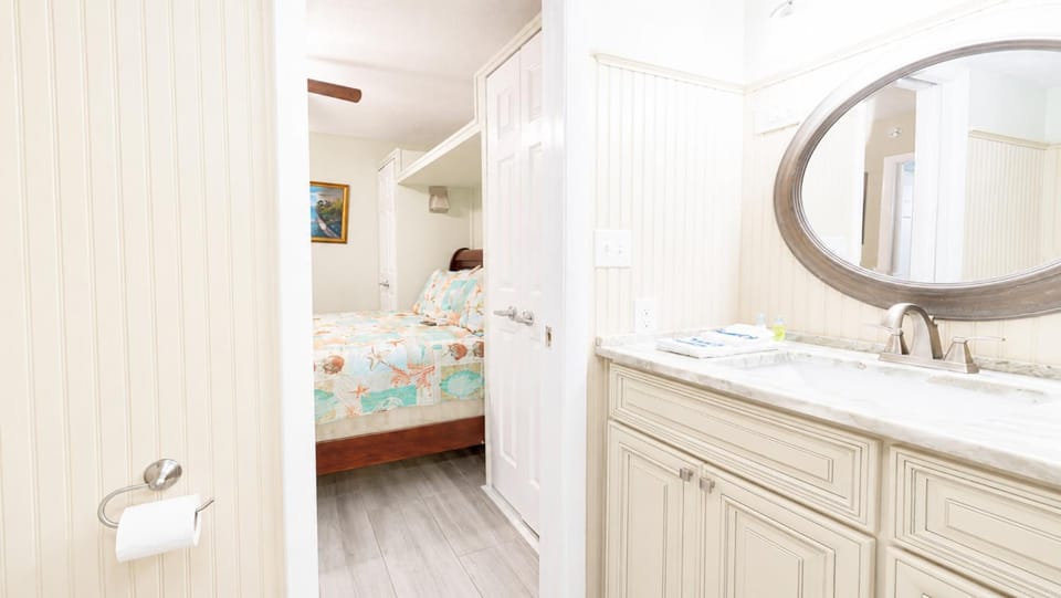 Shower, Toilet, Bed, towels, wardrobe