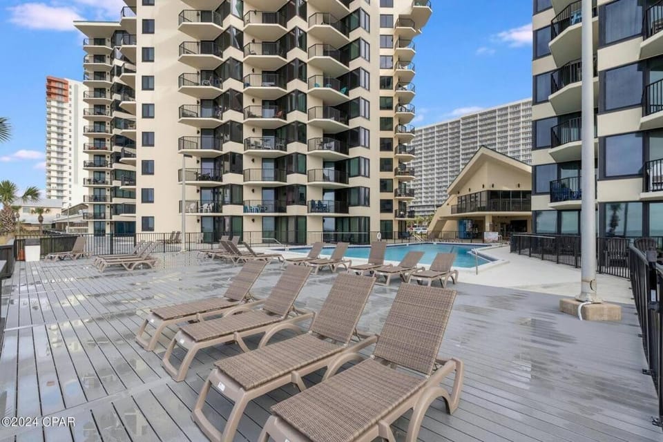 Property building, View (from property/room), Pool view, Swimming pool, sunbed
