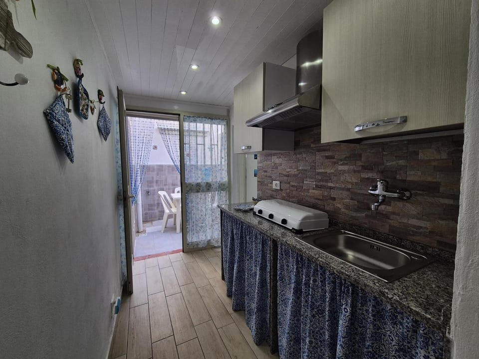 Kitchen or kitchenette, stove