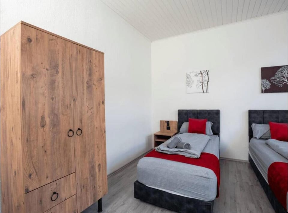 Bed, towels, wardrobe