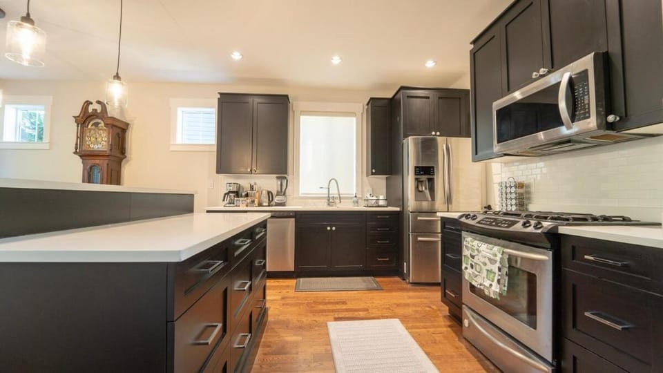 Kitchen or kitchenette, dishwasher, oven, stove, toaster