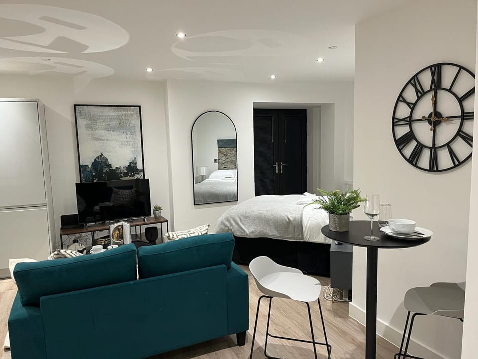 Bed, Living room, Seating area