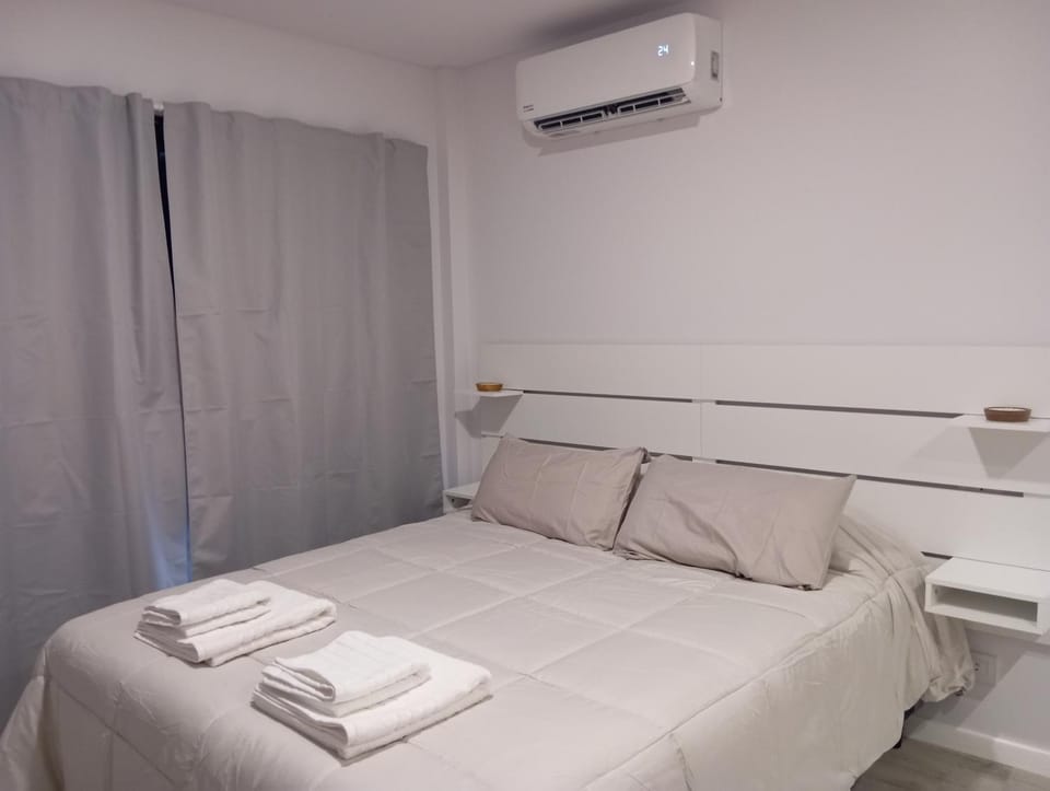 Bed, Bedroom, towels, air conditioner