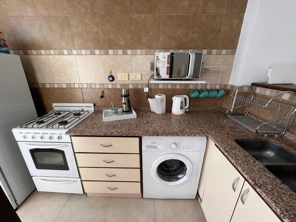 Coffee/tea facilities, Kitchen or kitchenette, oven, washing machine