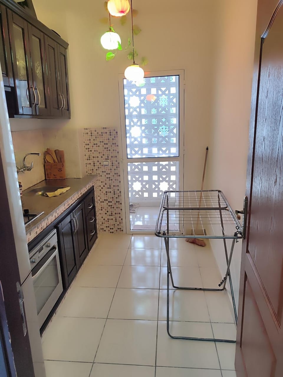 Kitchen or kitchenette, oven