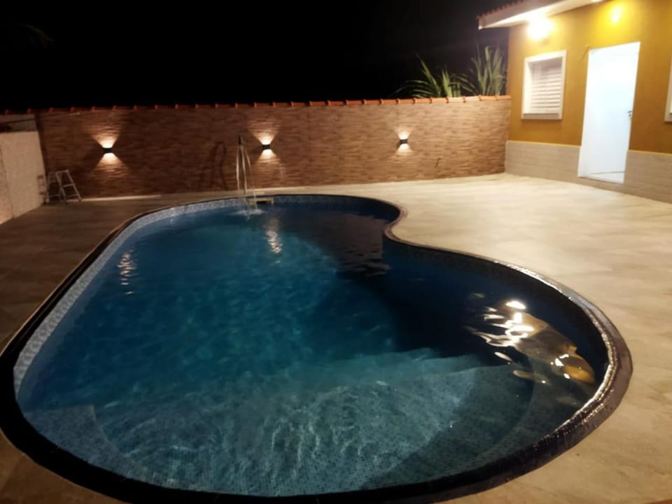Casa agradável com piscina House in Bertioga