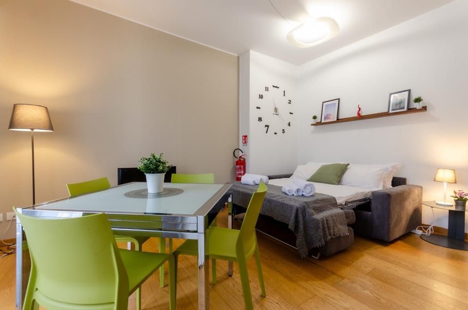 Bed, Living room, Seating area, Dining area
