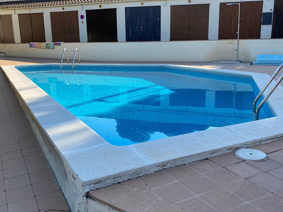 Property building, Living room, Swimming pool