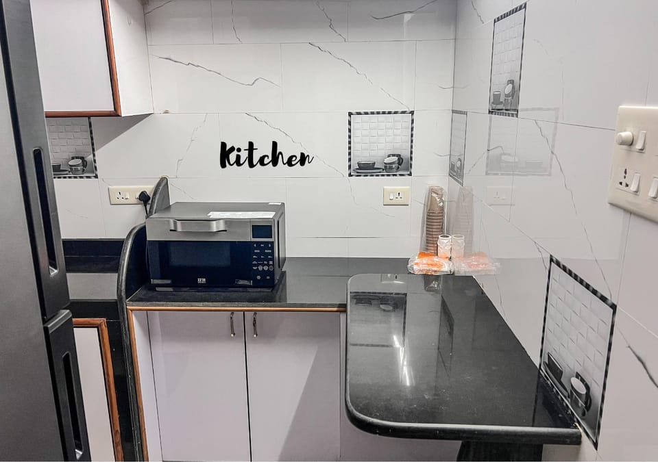 Kitchen or kitchenette, microwave