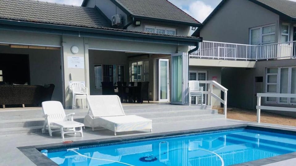 Property building, Patio, Day, Pool view, Swimming pool