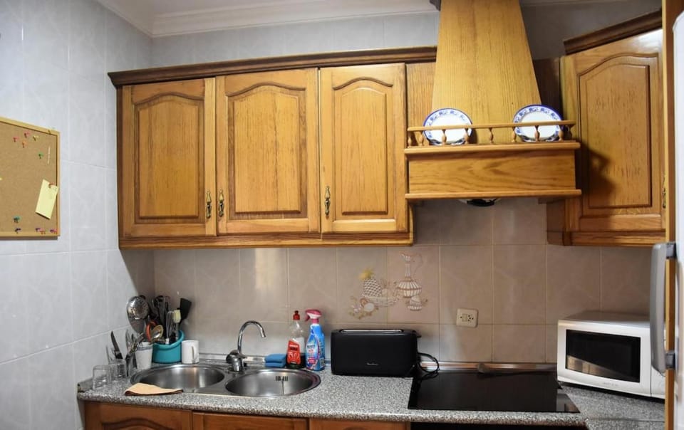 Kitchen or kitchenette, oven, stove, toaster