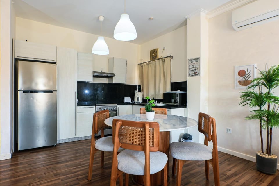 Kitchen or kitchenette, Dining area, dishwasher, oven, stove, toaster, air conditioner
