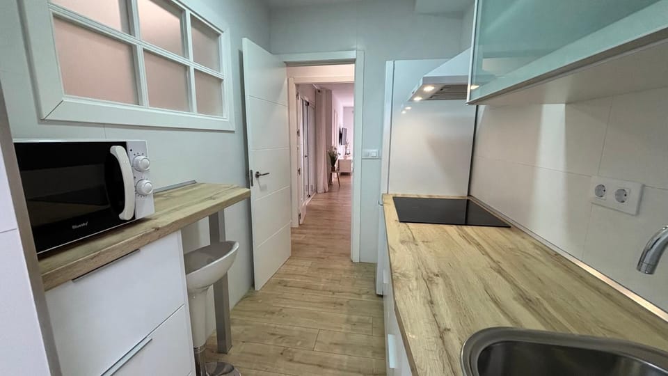 Kitchen or kitchenette, oven, stove