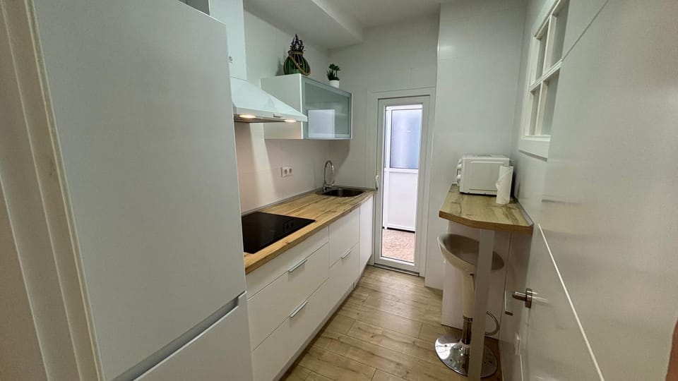 Kitchen or kitchenette, oven, stove