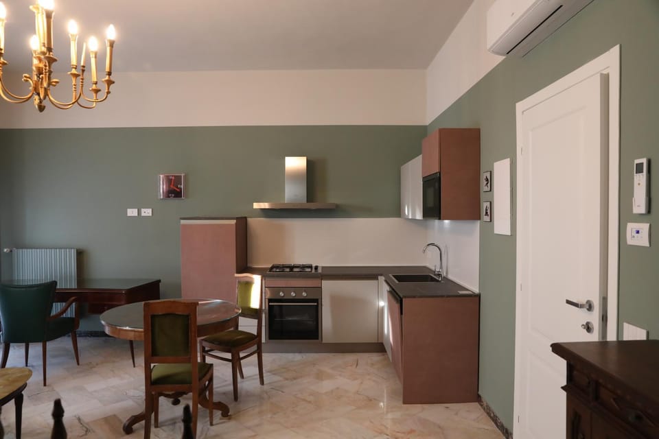 Kitchen or kitchenette, Kitchen or kitchenette, Living room, Seating area, Dining area, oven, stove