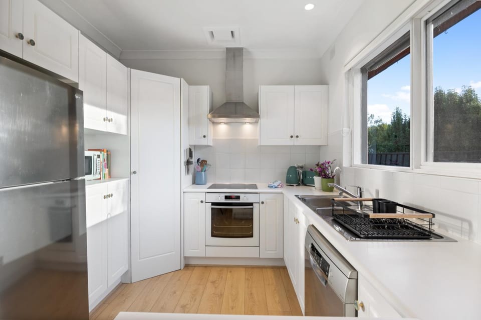 Kitchen or kitchenette, dishwasher, oven, stove, toaster