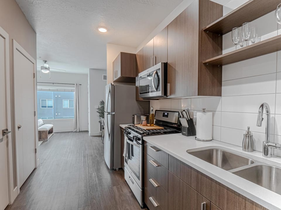 Kitchen or kitchenette, microwave, oven, stove