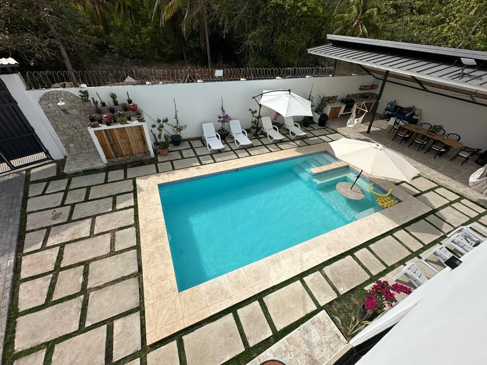 Property building, Patio, Pool view, sunbed