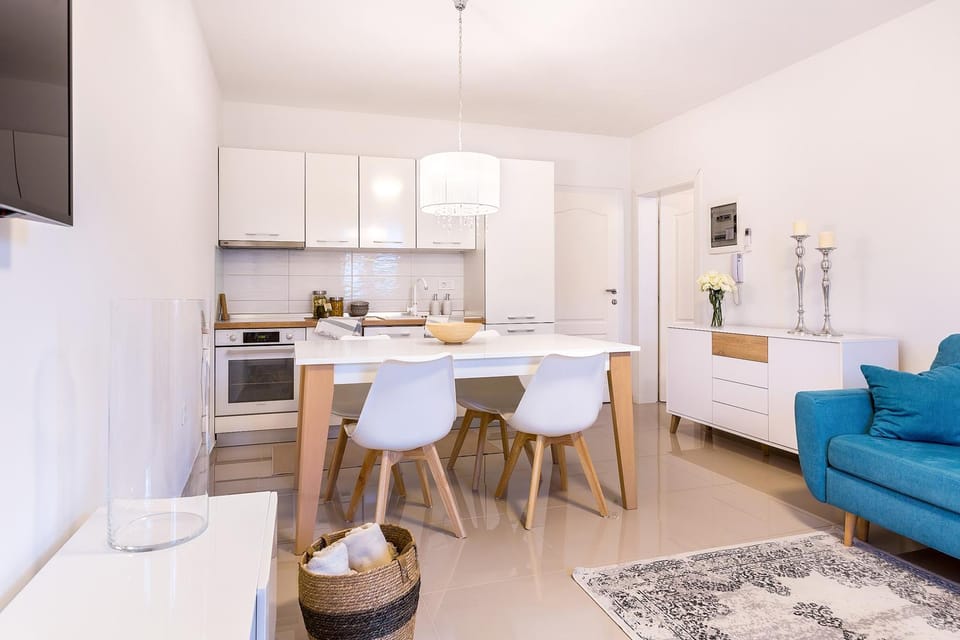 Kitchen or kitchenette, Seating area, Dining area, dishwasher, oven, stove